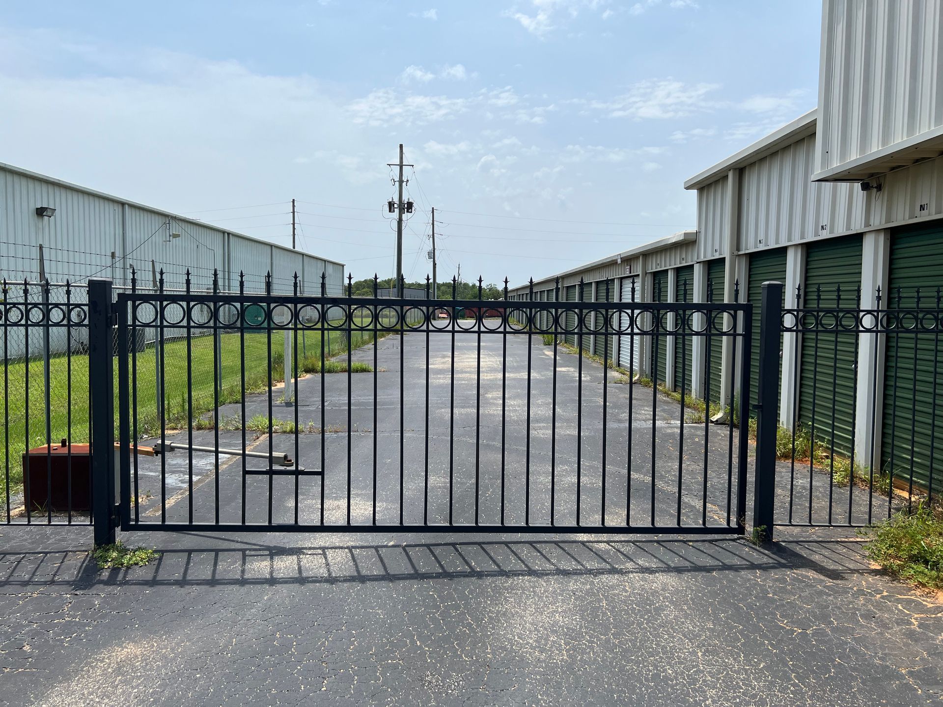 A gate in front of a storage facility