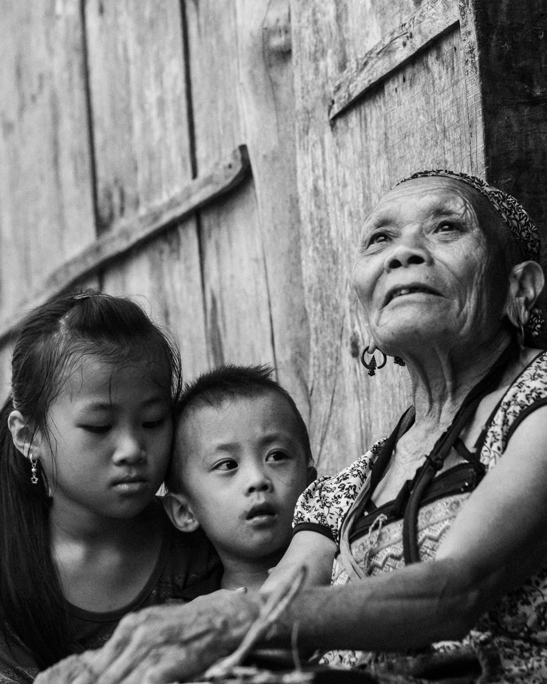 Aging is nature’s imprint etched in skin, carried through gaze, and reflected in generational  bond.