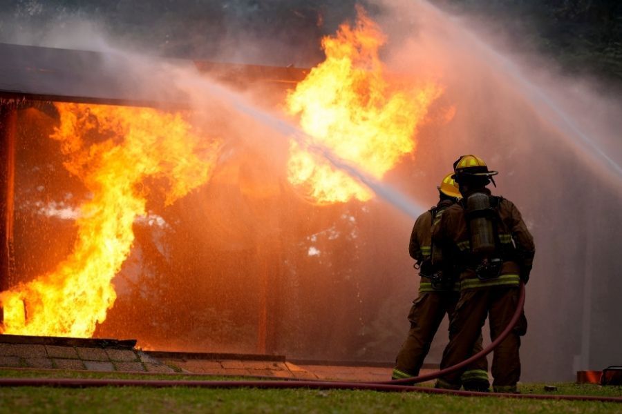 Water damaged ceiling and burned insulation in a Central Florida home after a lightning fire