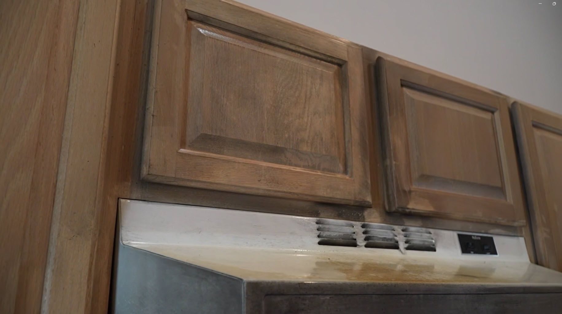 Kitchen grease fire damage before restoration