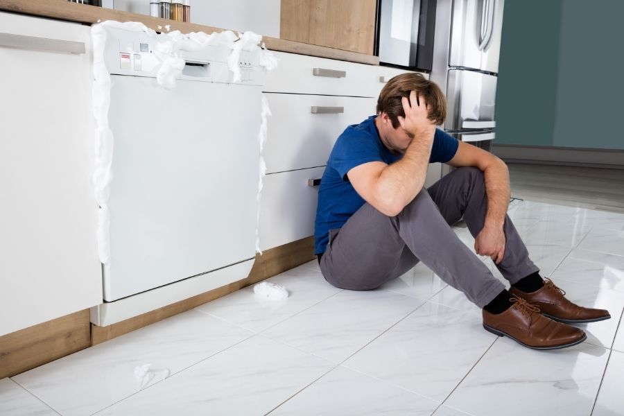 Dishwasher water line malfunction causing leak