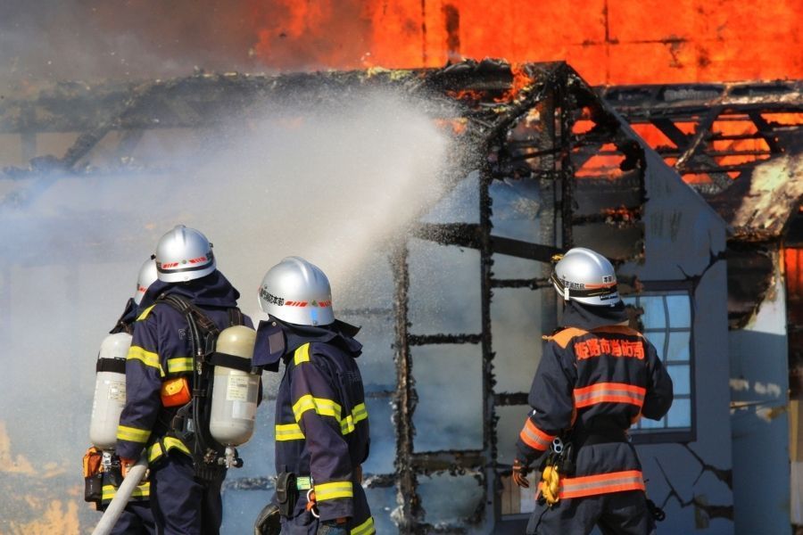 Firefighters responding to a structure fire