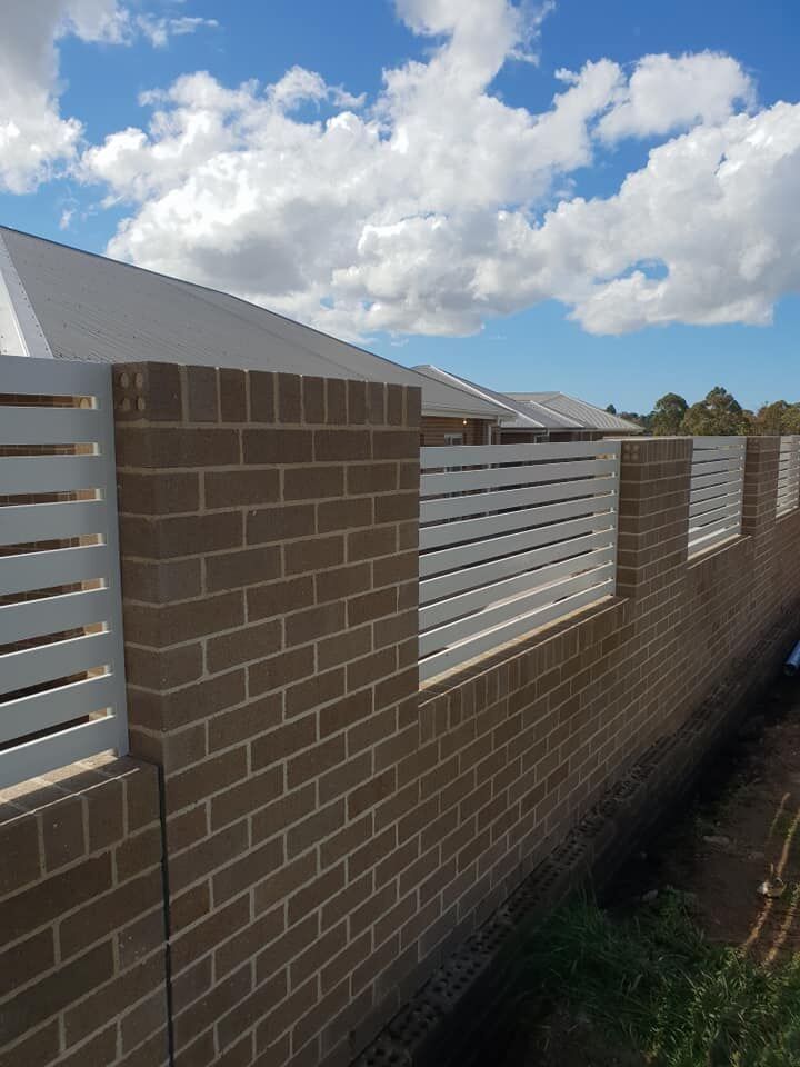 White plantation shutters/fence