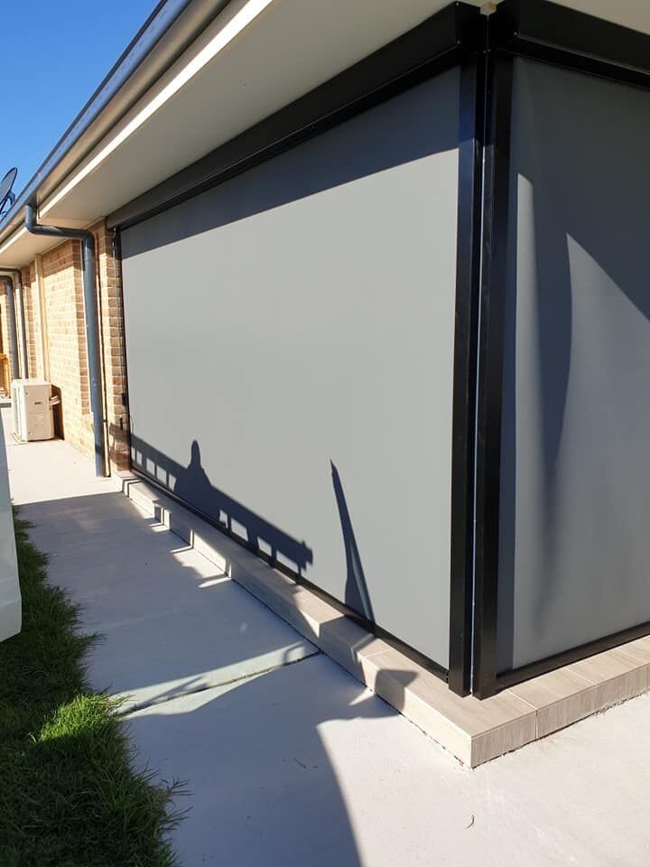 Straight drop veranda awning mounted on a metal frame