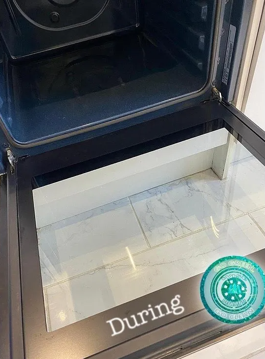 A close up of the inside of an oven with the door open.