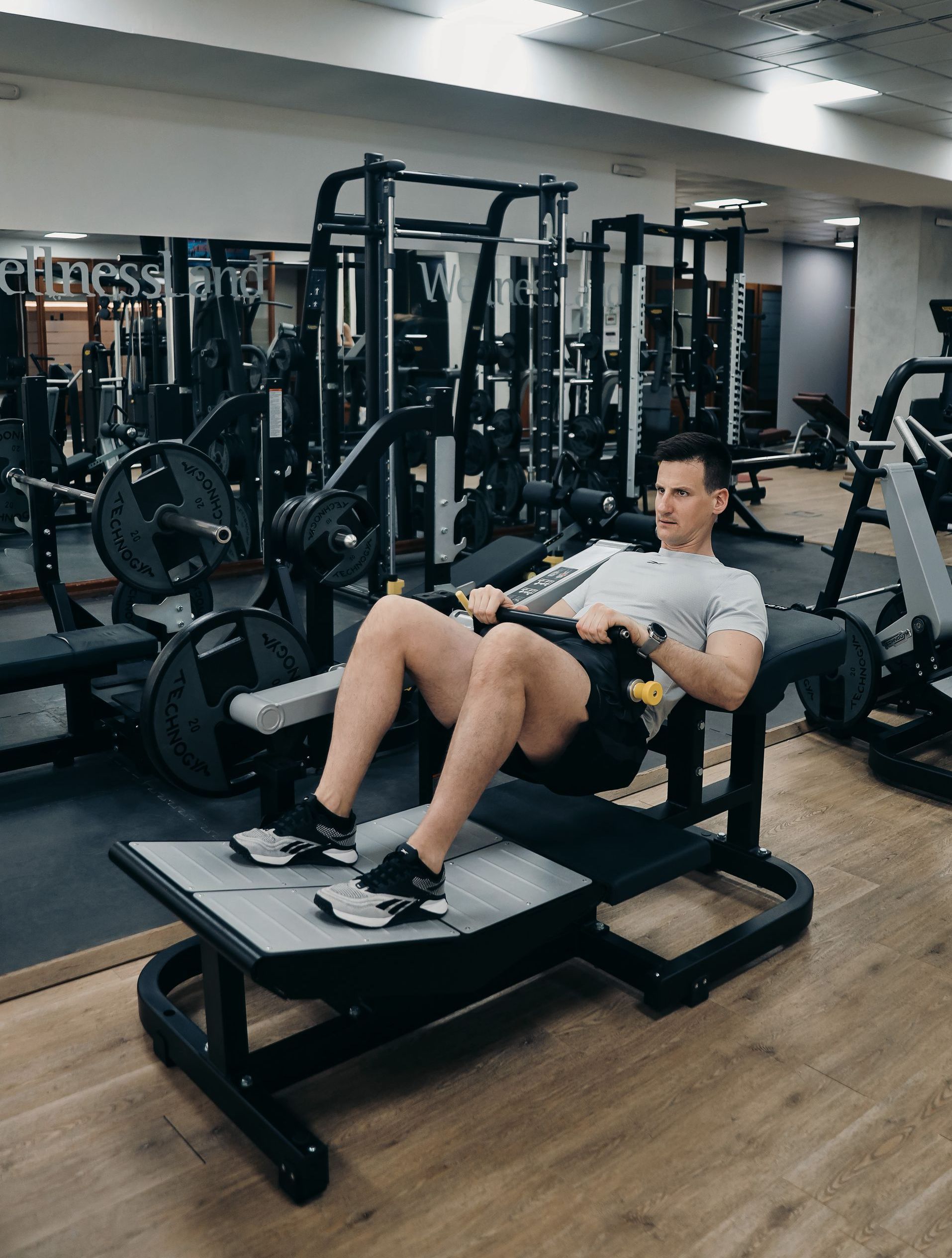 a man is doing hip thrusts 