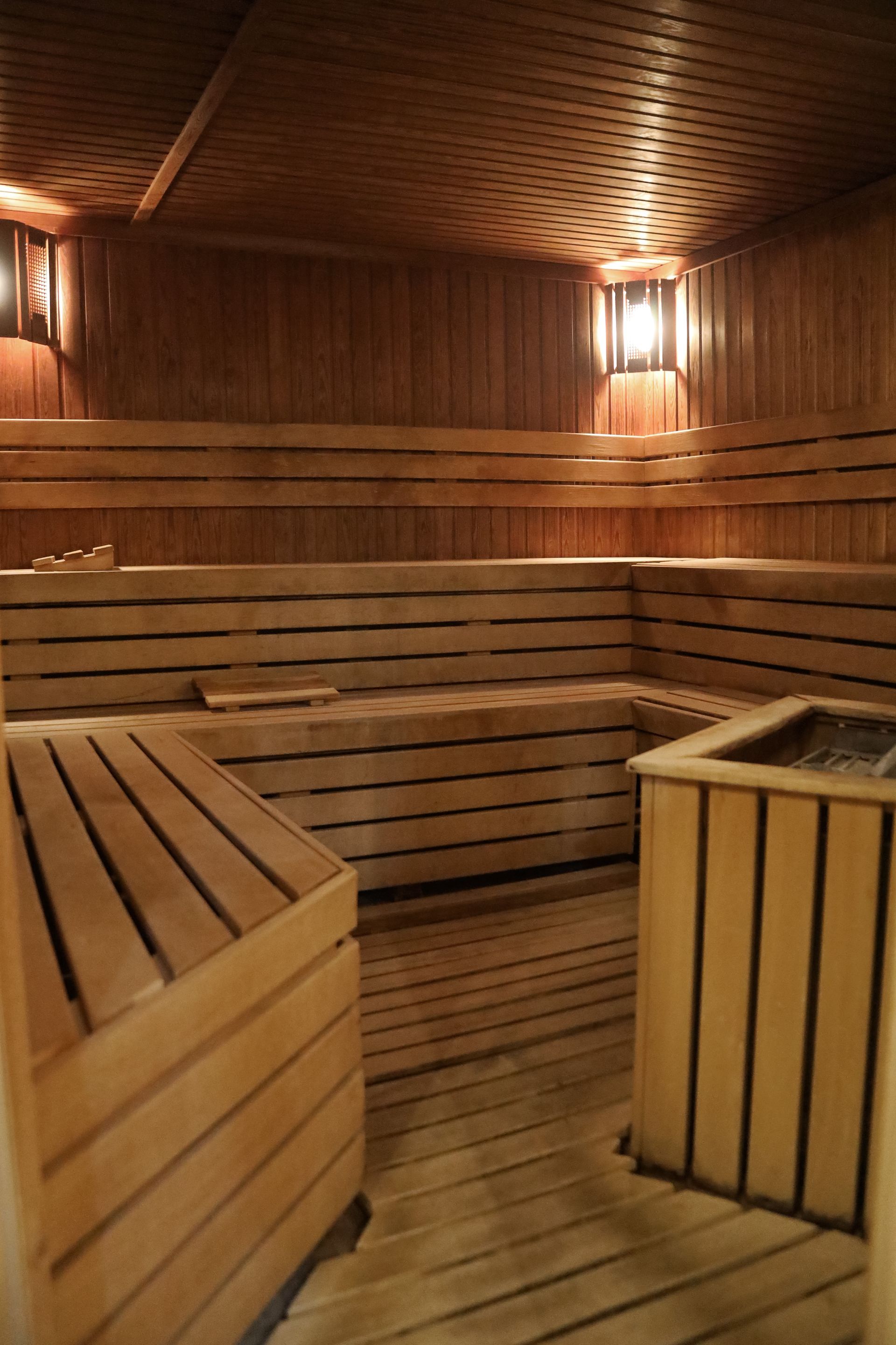 a wooden sauna with a lot of wooden benches