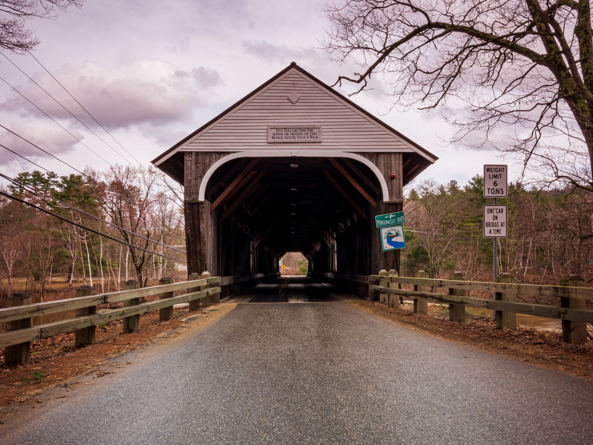 A covered bridge with the number 13 on it