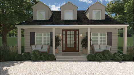 Une petite maison avec un porche et beaucoup de fenêtres.