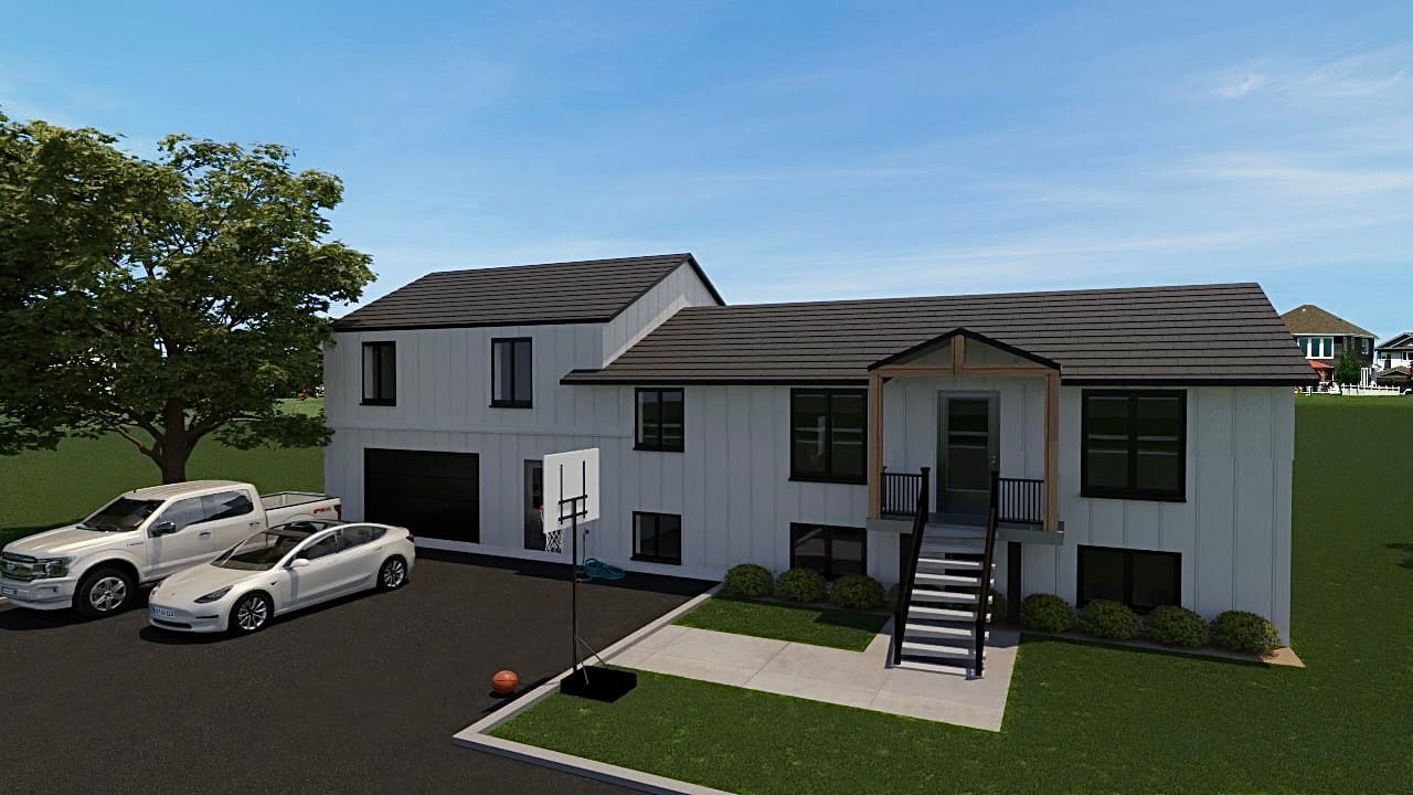 Une maison blanche avec deux voitures garées devant.