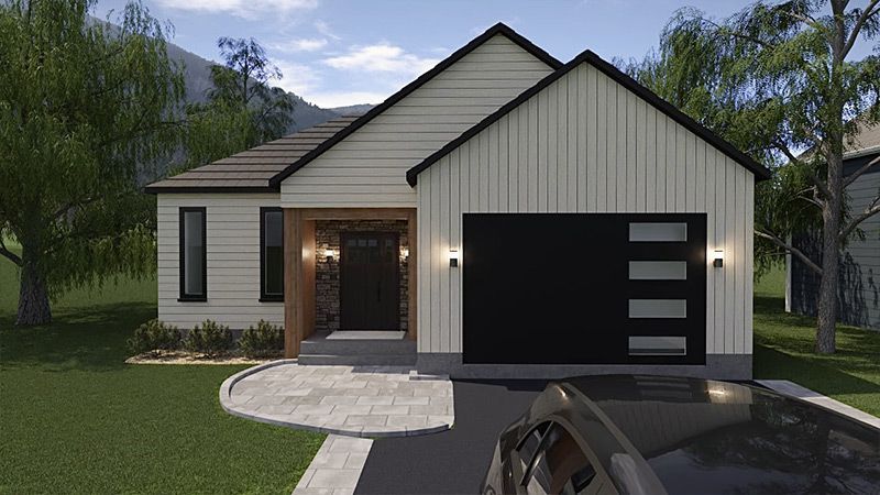 Une maison blanche avec une porte de garage noire et une voiture garée devant.