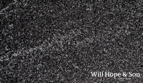 A close up of a black carpet with the words will hope & son on it