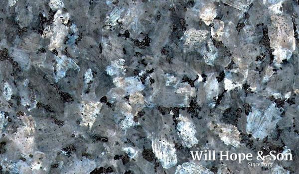 A close up of a blue granite counter top