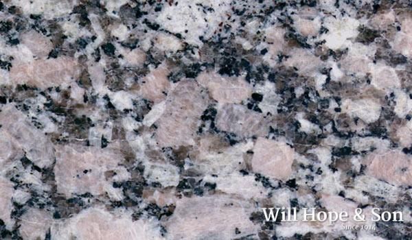 A close up of a granite counter top by will hope & sons