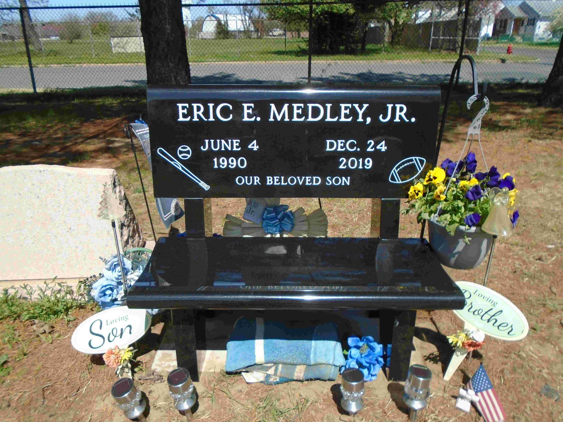 A stone bench with the name blake willard on it