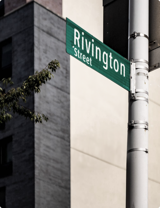 A street sign of the Rivington street on a pole