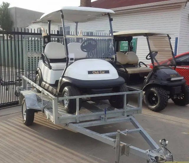 New White Golf Cart On The UTE Trailer — Golf Carts and Auto Electrical Services in Orange
