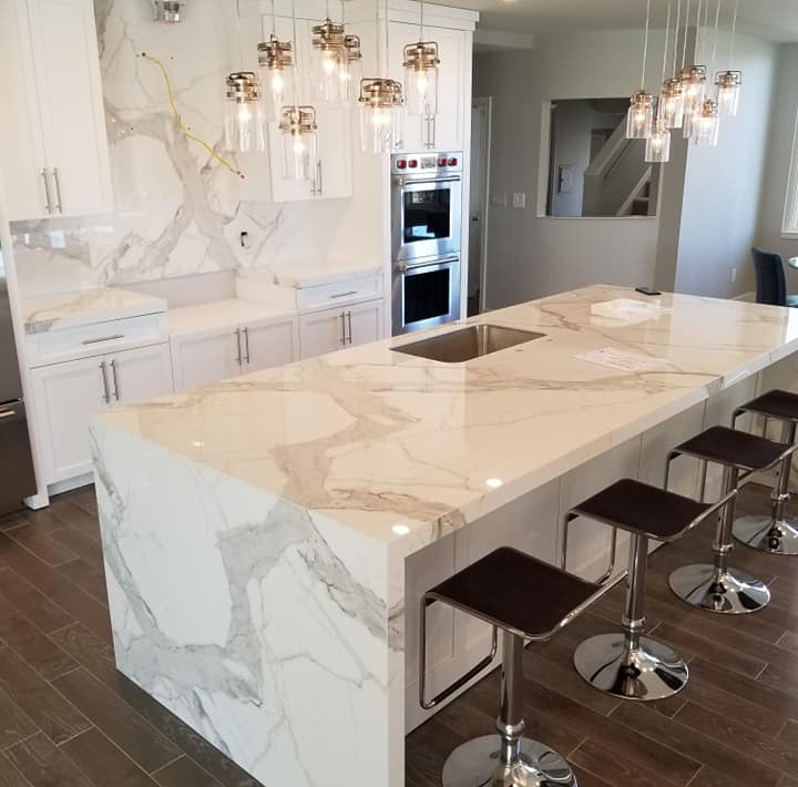 Nice kitchen quartz countertops fabricated and installed by L&E Marble and Granite