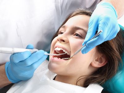 Dental Services — Dentist Cleaning Girl's Teeth in San Diego, CA
