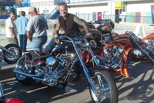 Man at Motor - Motor Cycle Maintenance in Venice, FL