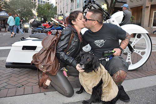 Man And Woman with Dog  - Motor Cycle Maintenance in Venice, FL