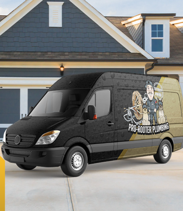 a pro-rooter plumbing van is parked in front of a house