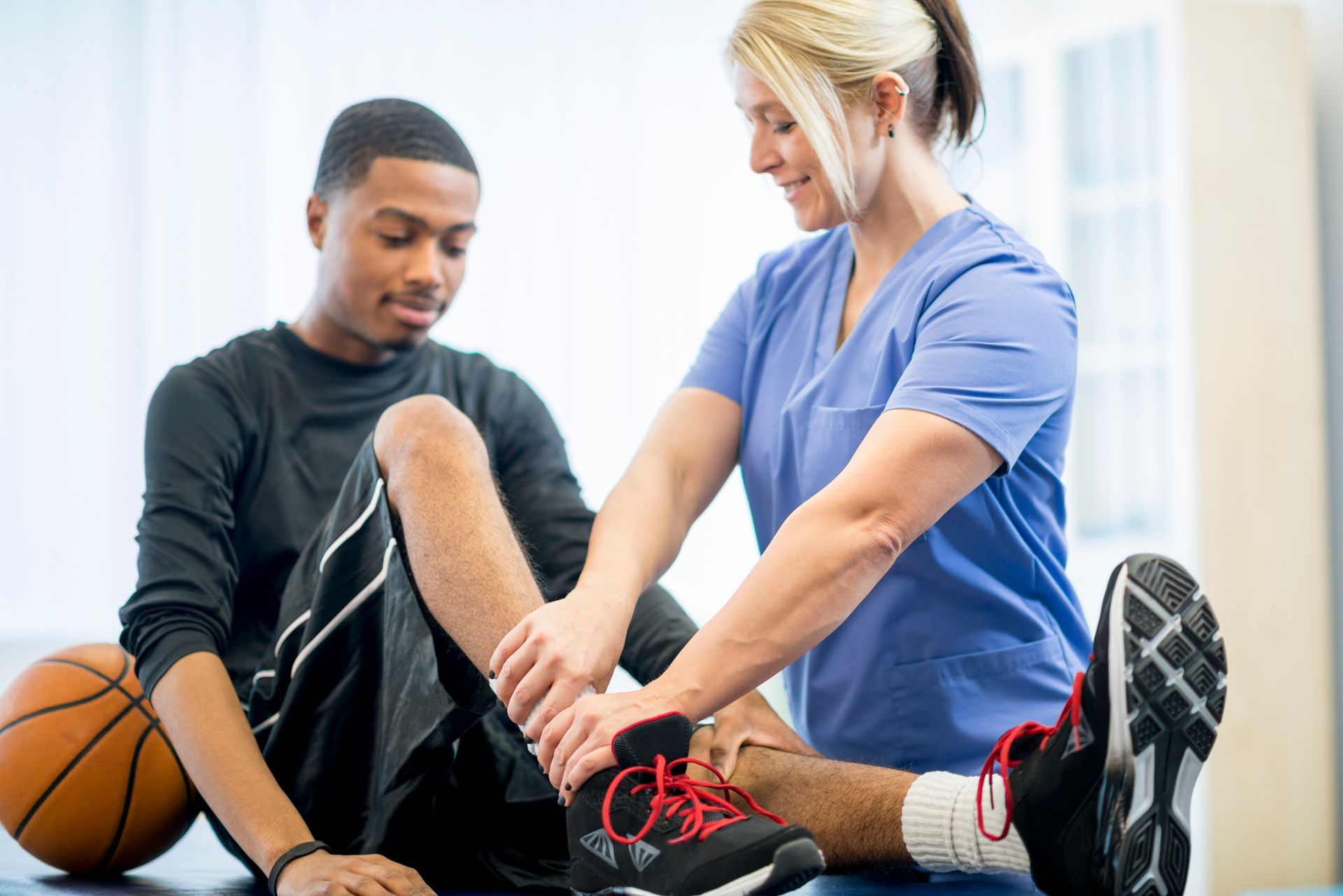Basketball Player Getting Physical Therapy — Burien, WA — Southwest Seattle Physical Therapy & Sports Rehabilitation