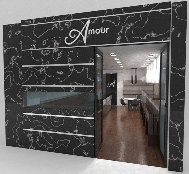 A store front with amour written on it