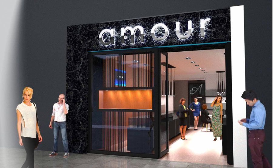 A group of people are standing outside of a store called amour