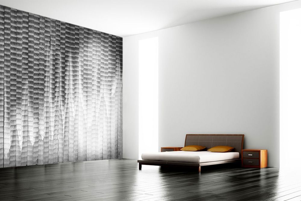 A bedroom with a bed and curtains on the wall