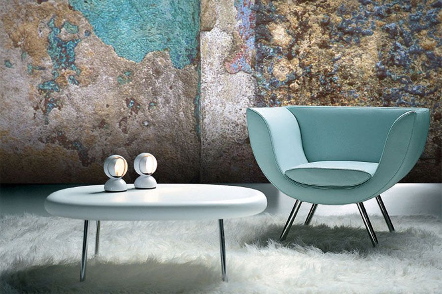 A living room with a chair and a coffee table