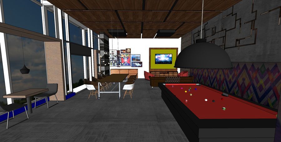 A pool table is in the middle of a living room