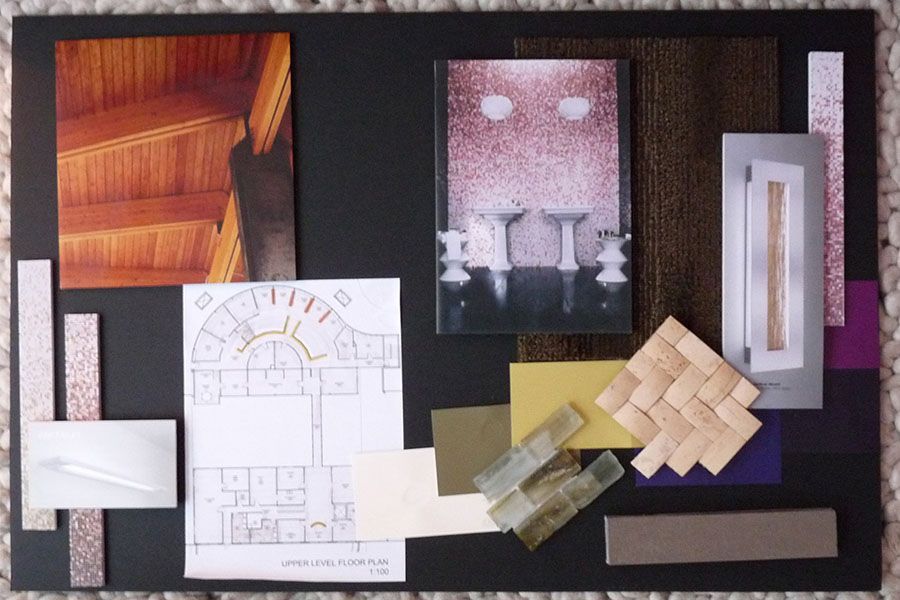 A bulletin board with a picture of a staircase on it