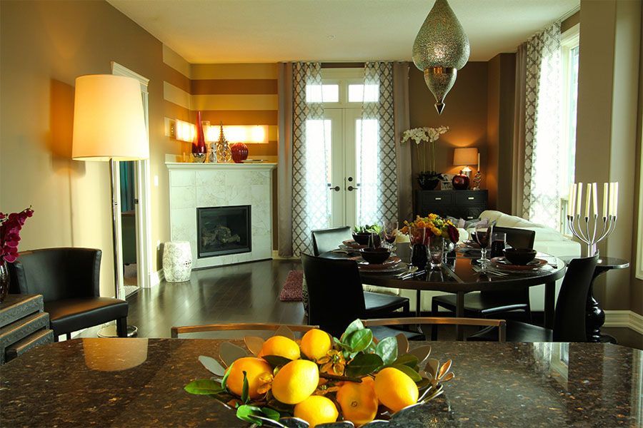 A bowl of lemons sits on a counter in a living room