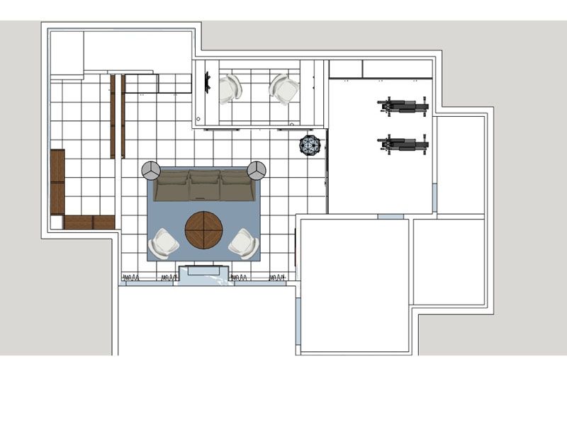 A floor plan of a living room with a couch and a coffee table