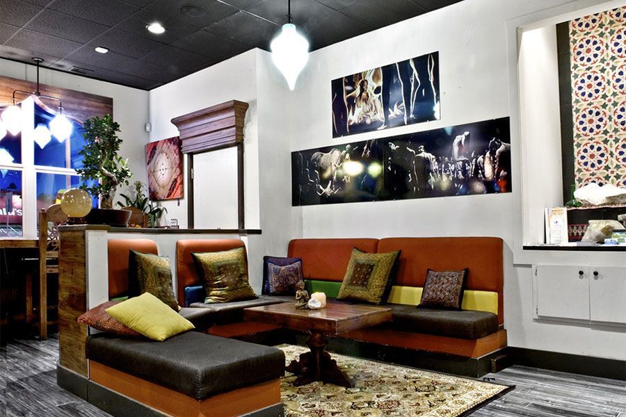 A living room with a couch and a table