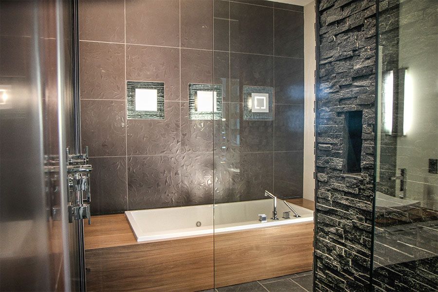 A bathroom with a bathtub and a sink