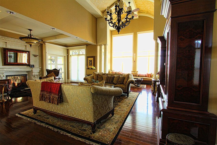 A living room filled with furniture and a fireplace