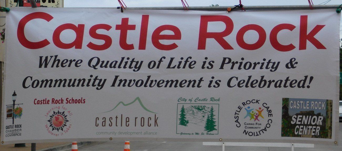 a sign for castle rock where quality of life is priority and community involvement is celebrated