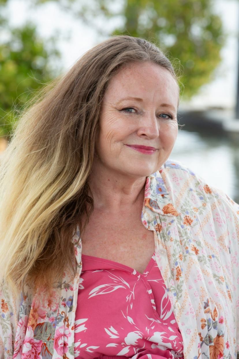 Woman With Long Blonde Hair — Daly Legal In Macksville, NSW