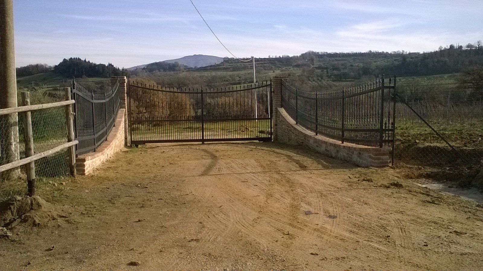 cancello di ferro battuto automatico