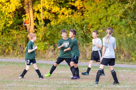 Pendleton FC players celebrating on the field