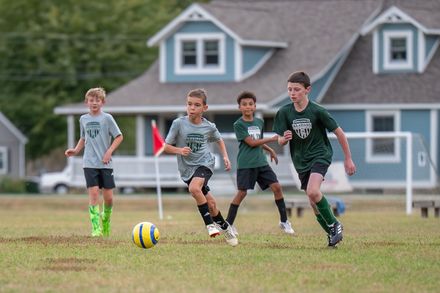 Boys playing soccer for Pendleton FC