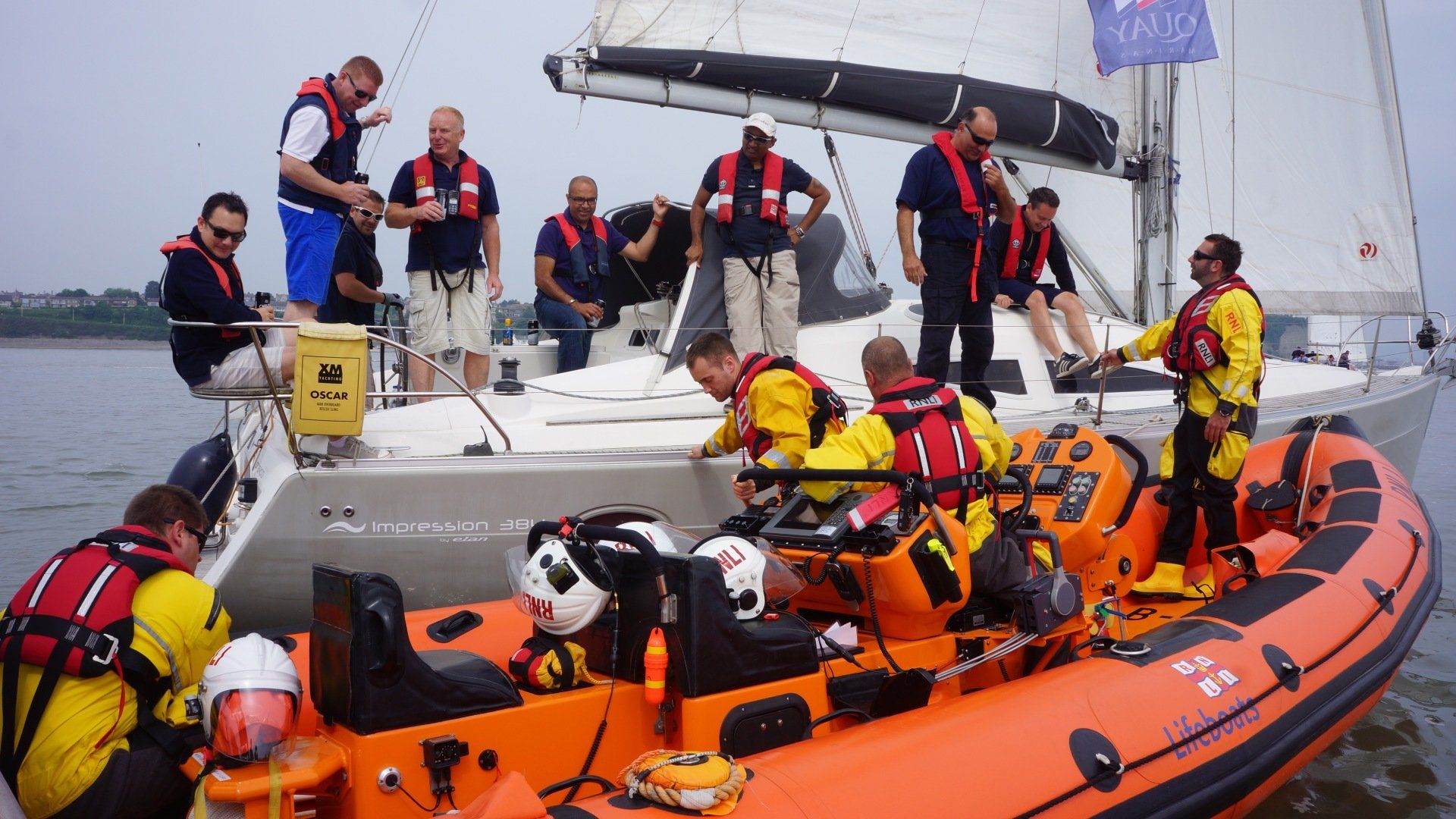 Yacht with lifeboat crew