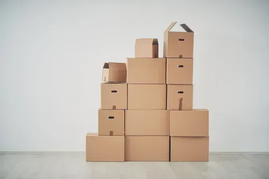 Cardboard Boxes Stacked in a Pyramid Shape, Ready for Moving — Premier Removals & Storage In Coffs Harbour, NSW