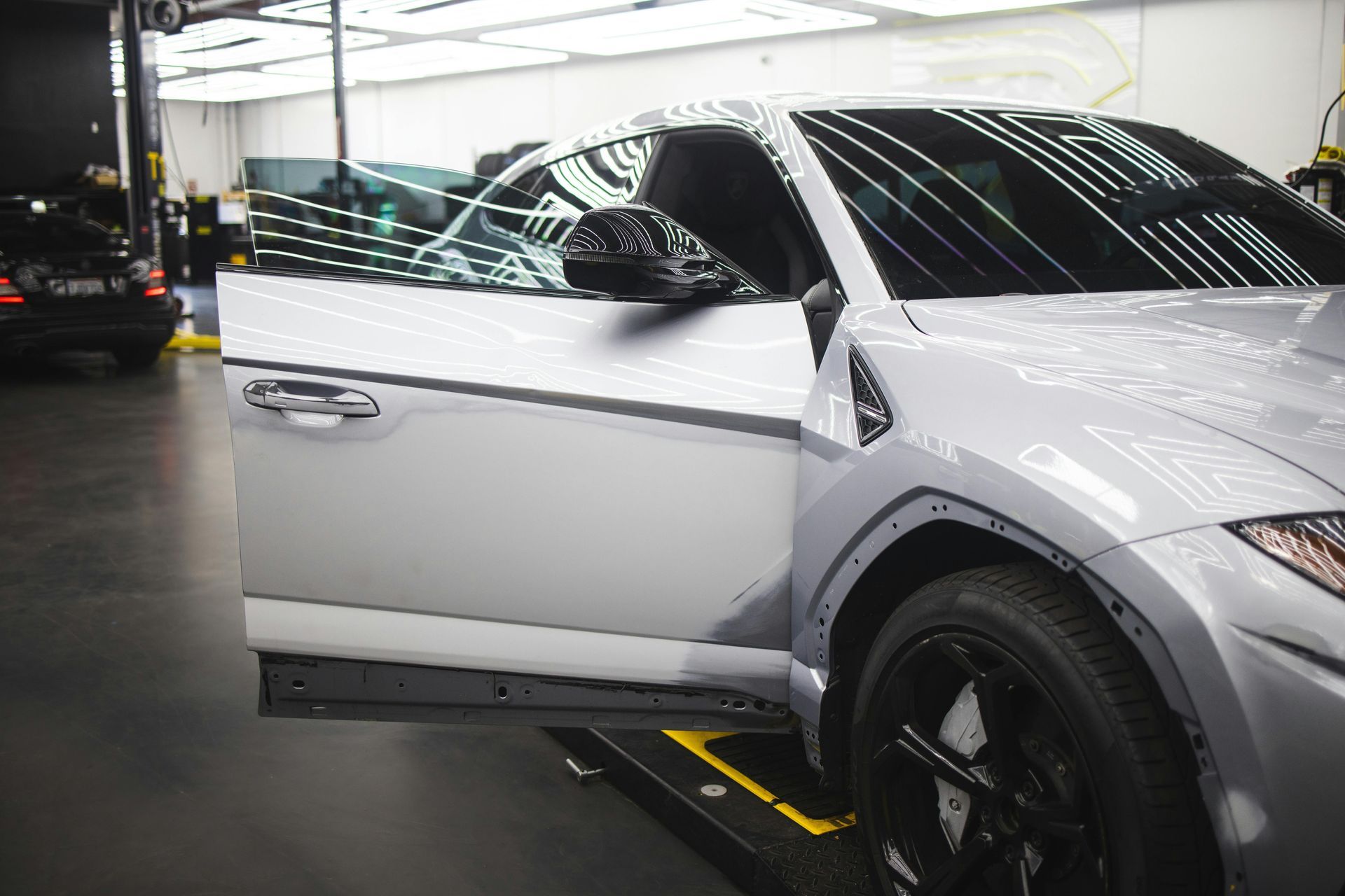 Side-by-side comparison of clear bra vs traditional paint protection 