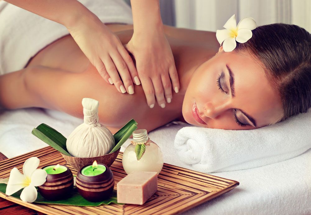 A Woman Is Getting A Massage At A Spa — Beauty Abode in Buderim, QLD
