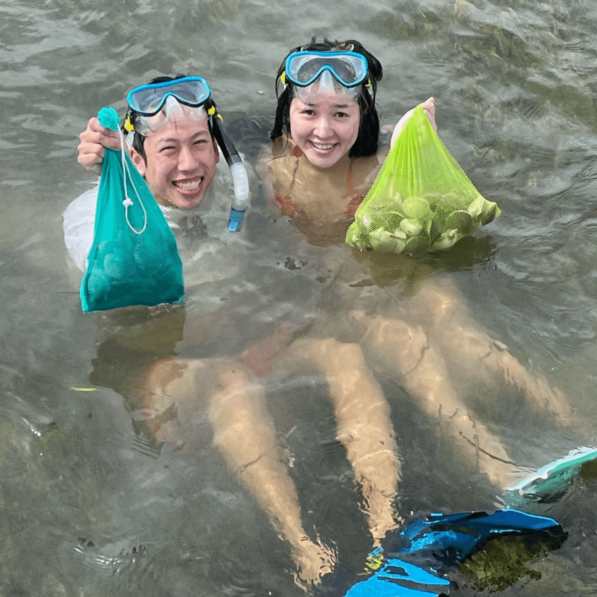 A couple scalloping for scallops