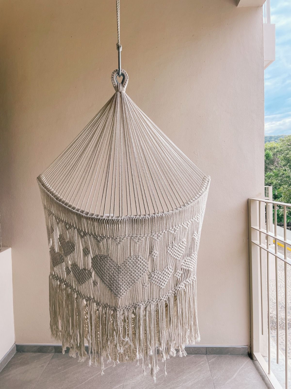 Balcón con columpio