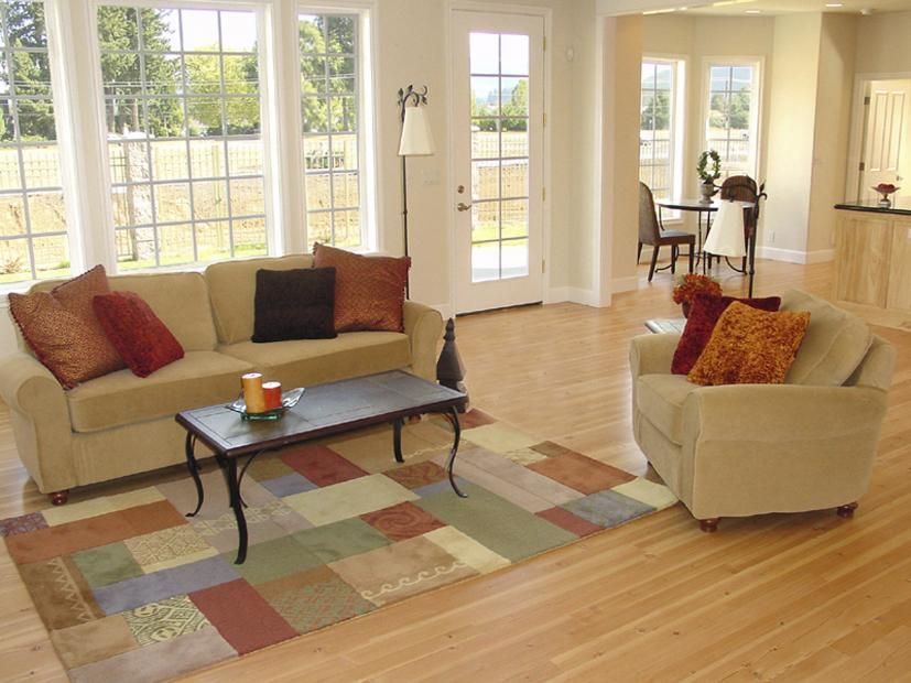 A living room with a couch a chair and a coffee table